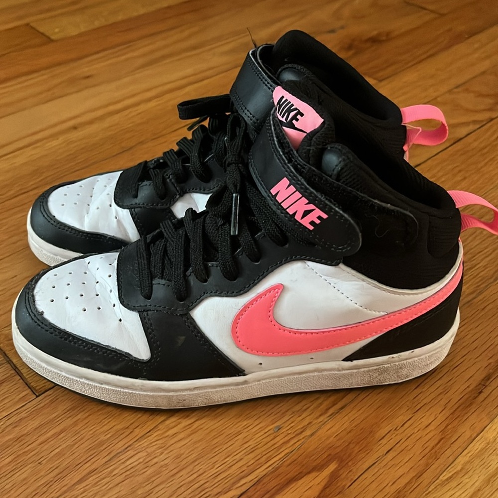 Youth size 4, Nike high top sneaker.
